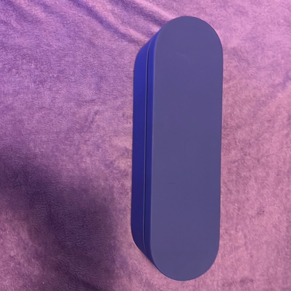 Dyson Coral Purple straightener - charger, stand, and box all included.